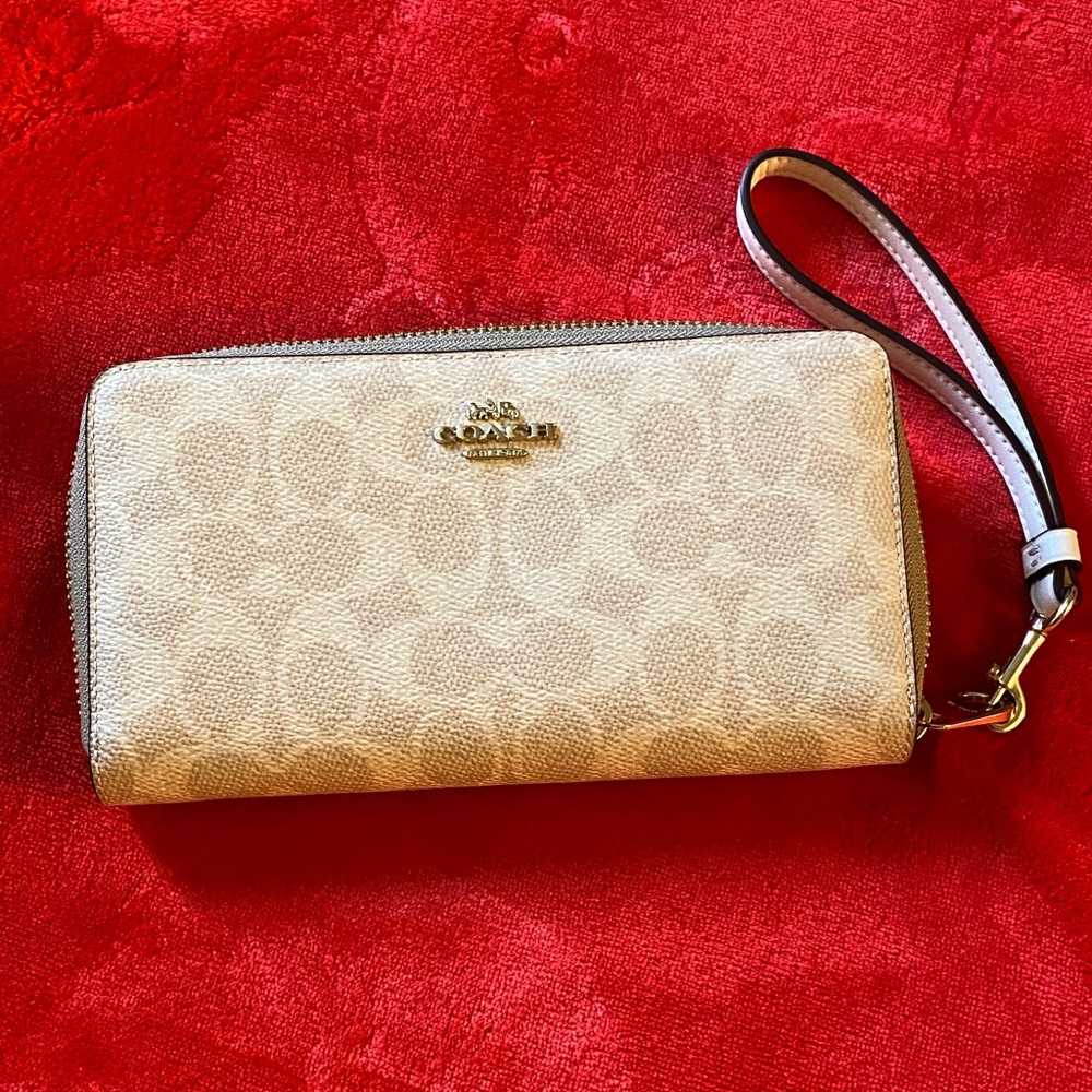 Coach Light Tan Wristlet with Logo Pattern
